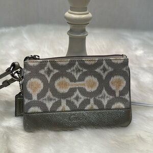 Coach, gray and pink cloth leather wristlet